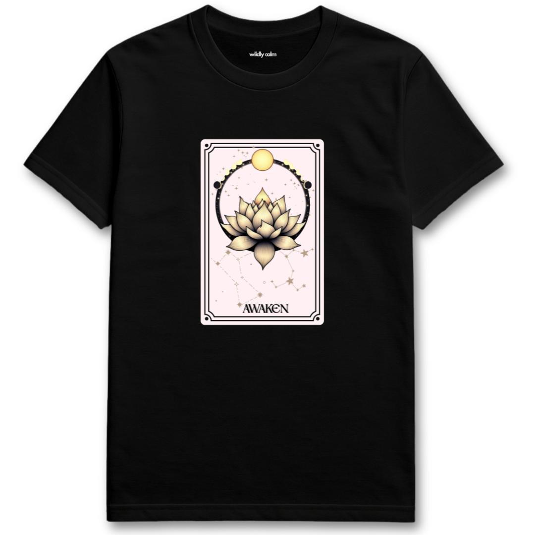 Celestial Lotus Black t-shirt with a tarot card-style design featuring a lotus flower and 'Awaken' text for Yoga - Wildly Calm