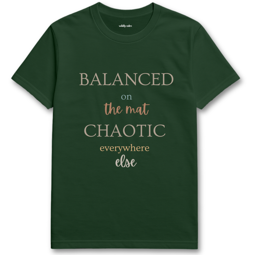 Balanced on Mat forest green yoga t-shirt with white text - wildly calm