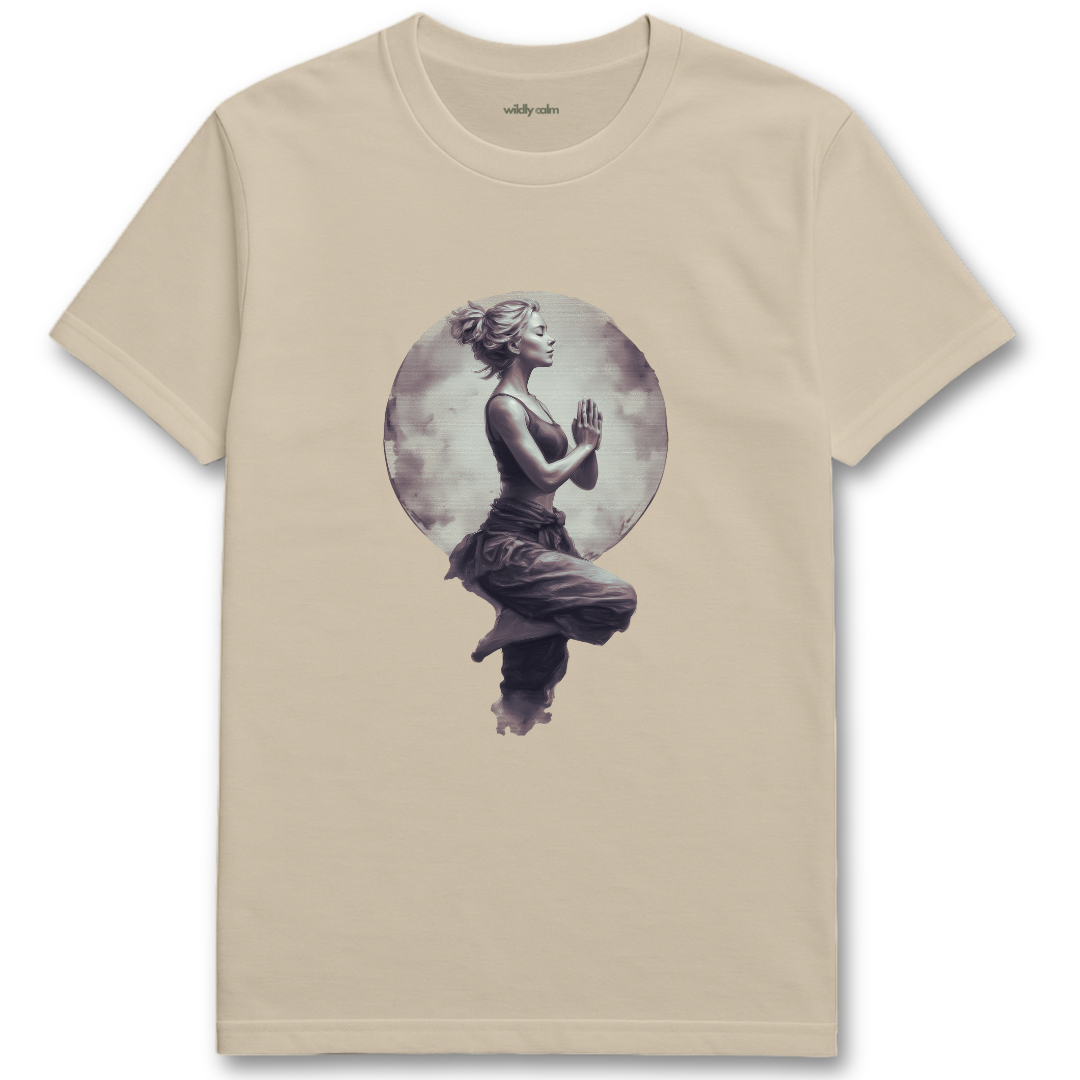 Lunar Yoga Pose sand/ beige yoga t-shirt with a graphic of a woman in a meditative pose against a moonlit background - wildly calm