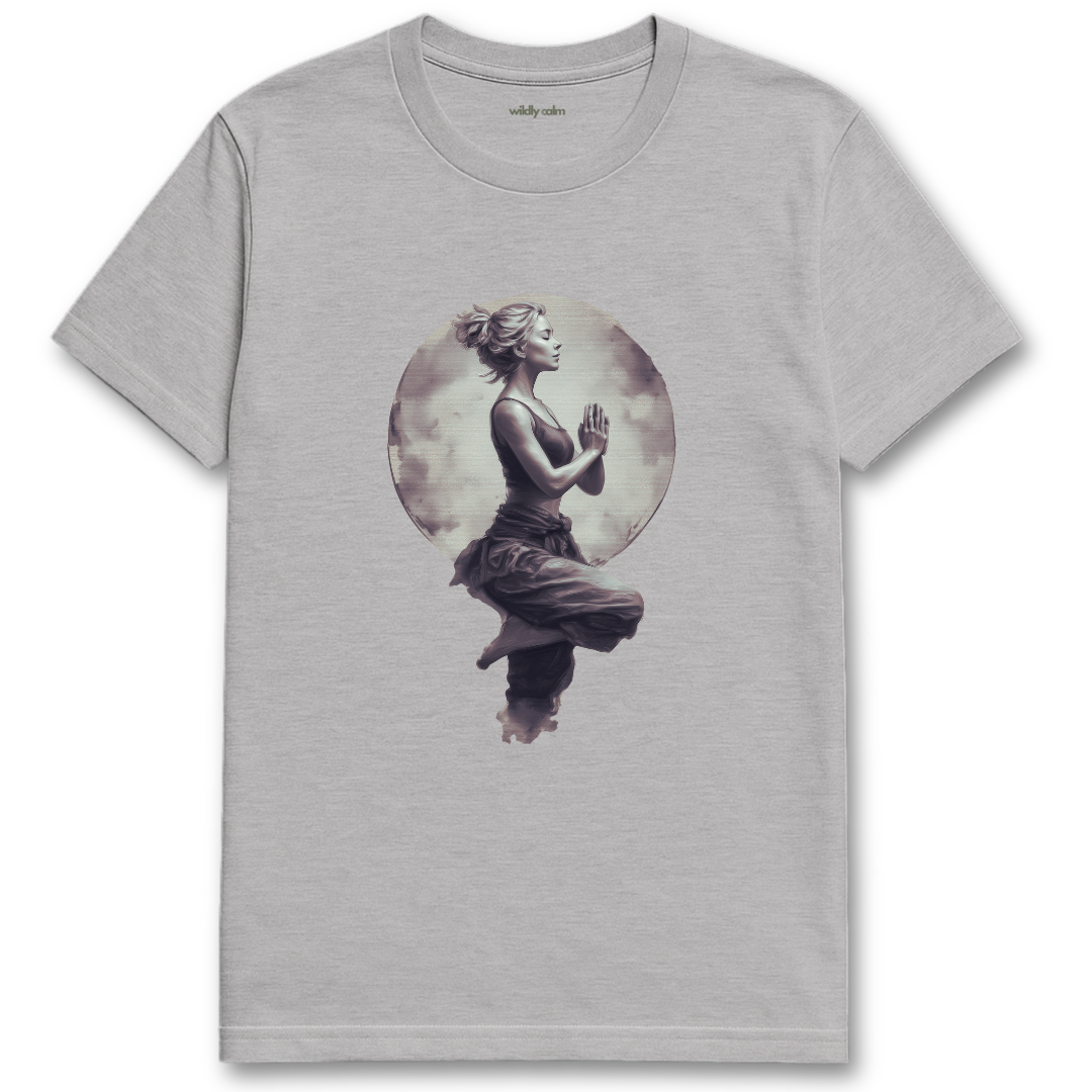 Lunar Yoga Pose sports grey yoga t-shirt with a graphic of a woman in a meditative pose against a moonlit background - wildly calm