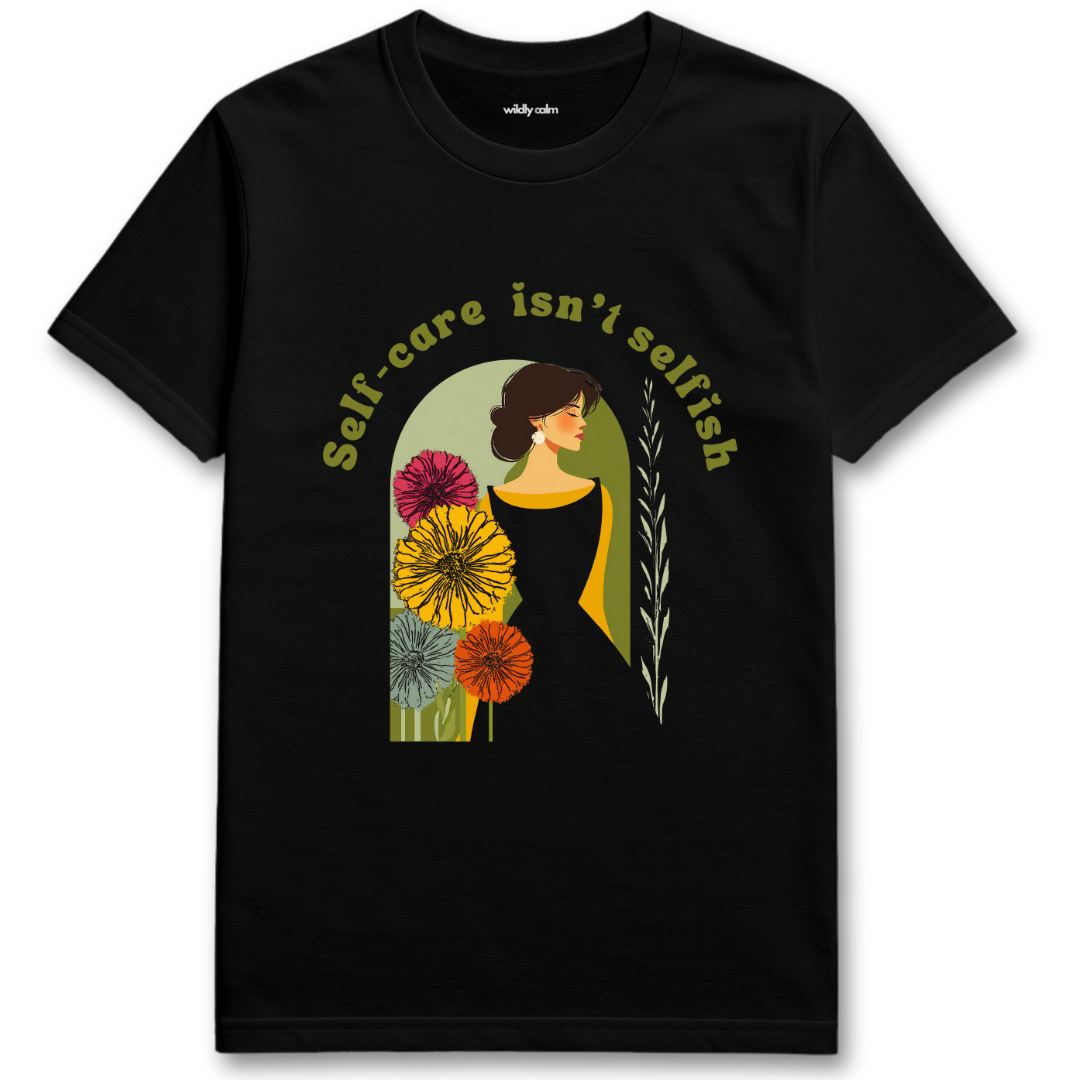 Self Care Isn't Selfish Black t-shirt with a graphic of a woman surrounded by flowers and the text 'Self-care isn't selfish'. - wildly calm