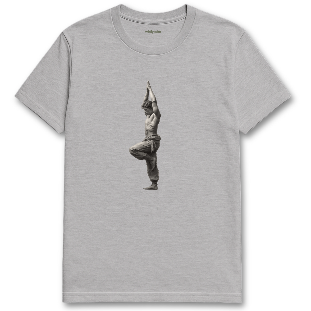 Tree pose-Man sports grey yoga t-shirt with a graphic of a person in a yoga pose - Wildly Calm