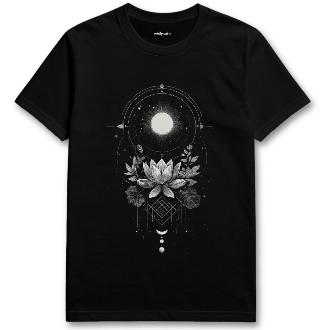 Lotus Radiance_Black t-shirt with a white geometric design and lotus flower on a white background - Wildly Calm