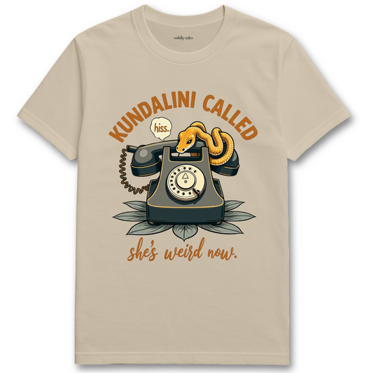 Sand/ Beige yoga t-shirt with a graphic of a phone and snake, text 'Kundalini Called she's weird now'- Wildly Calm