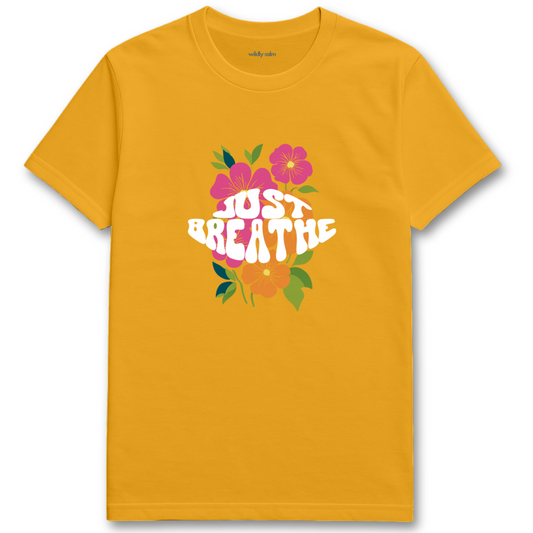 Gold yoga t-shirt with 'Just Breathe' text and floral design -wildly calm