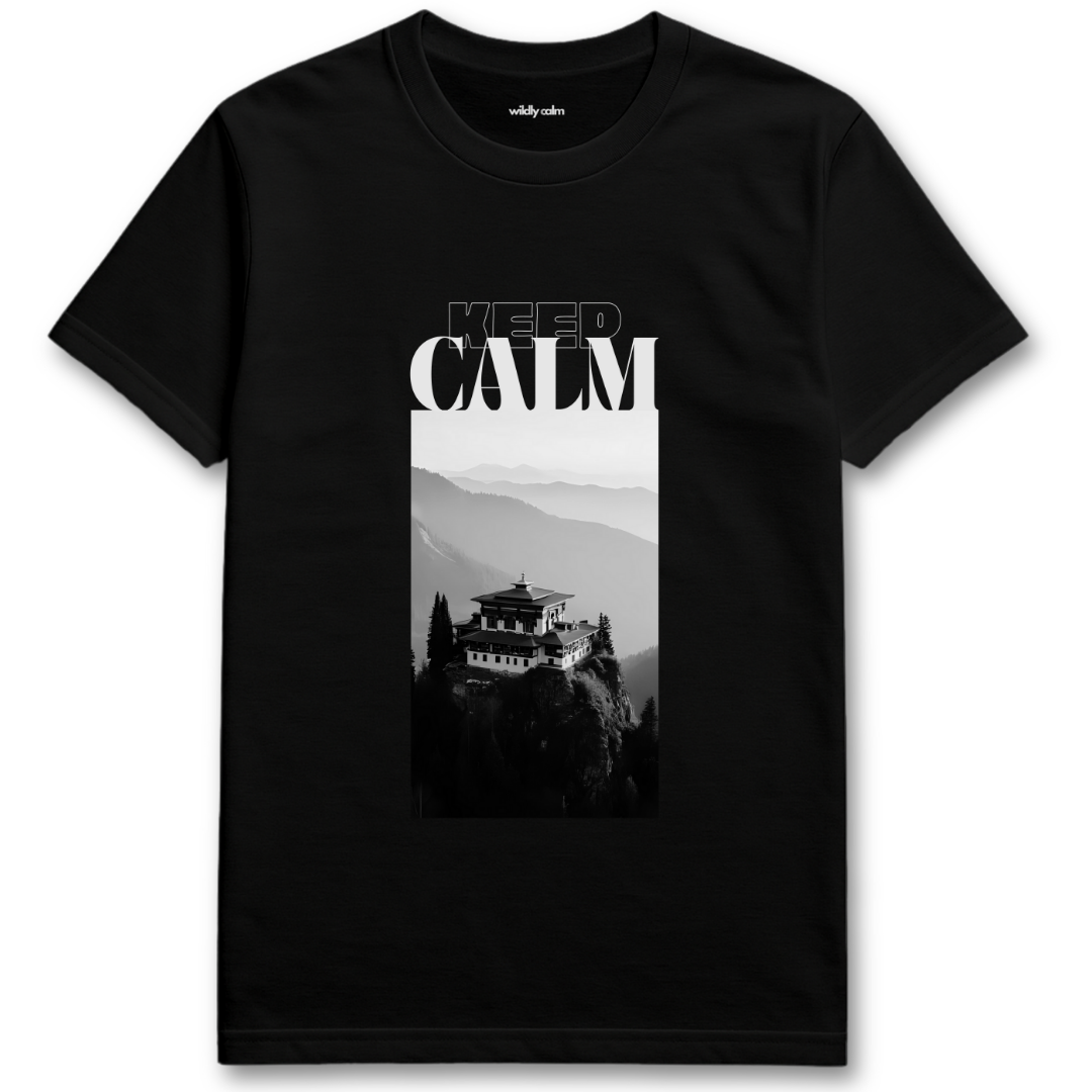 Black yoga t-shirt with a mountain and temple graphic and 'Keep Calm' text - Wildly Calm