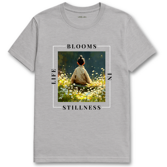 Life Blooms In Stillness sports grey yoga t-shirt with a graphic of a person sitting in a field and text 'BLOOMS LIFE STILLNESS' - wildly calm