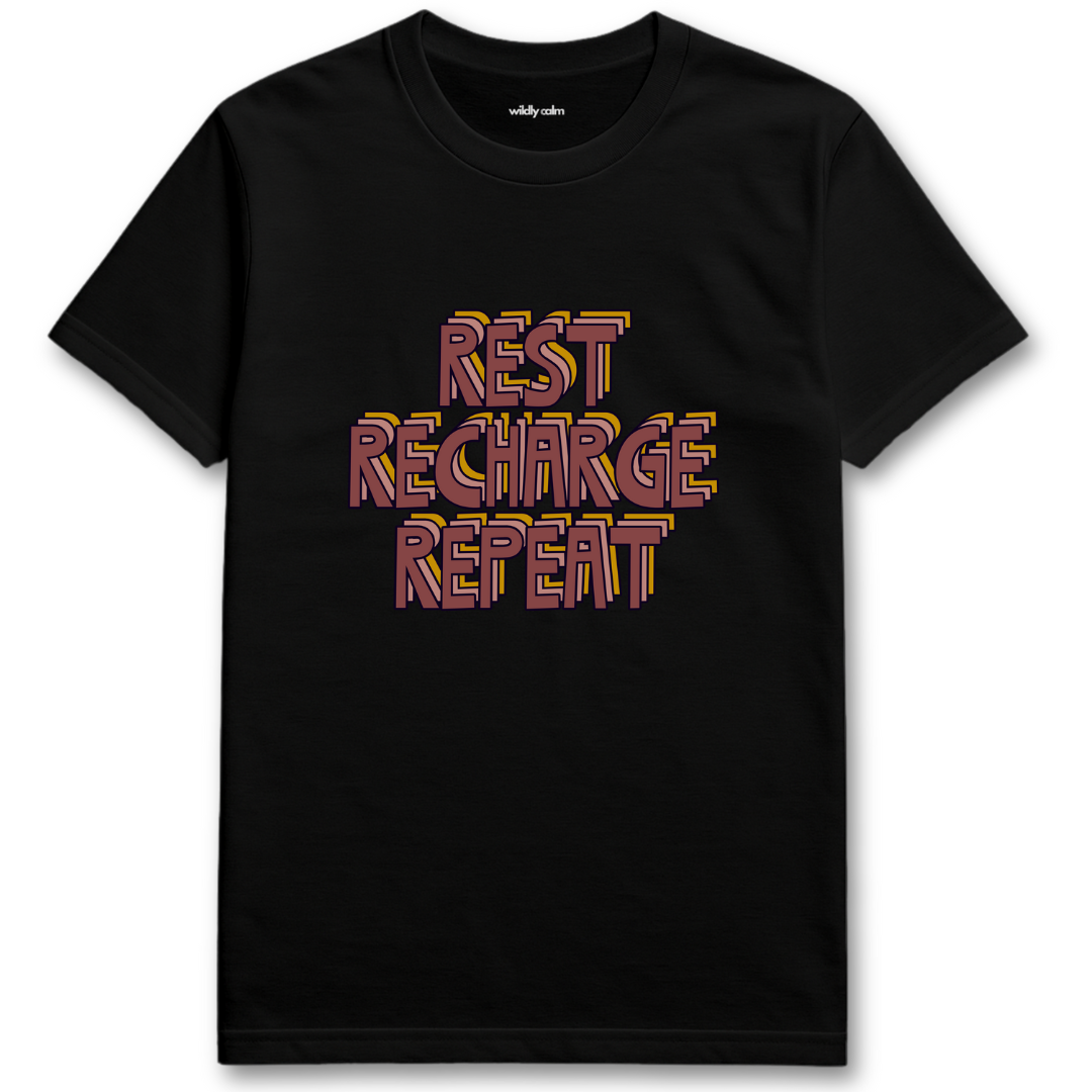 Black yoga t-shirt with 'REST RECHARGE REPEAT' text in colorful letters - wildly calm