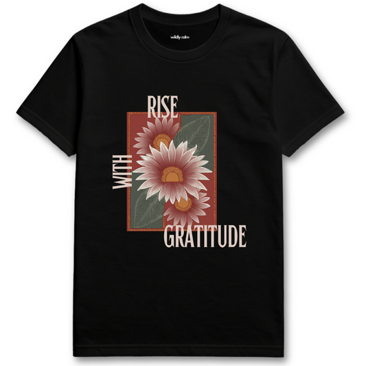 Black Yoga t-shirt with a floral design and text 'Rise with Gratitude' - wildly calm