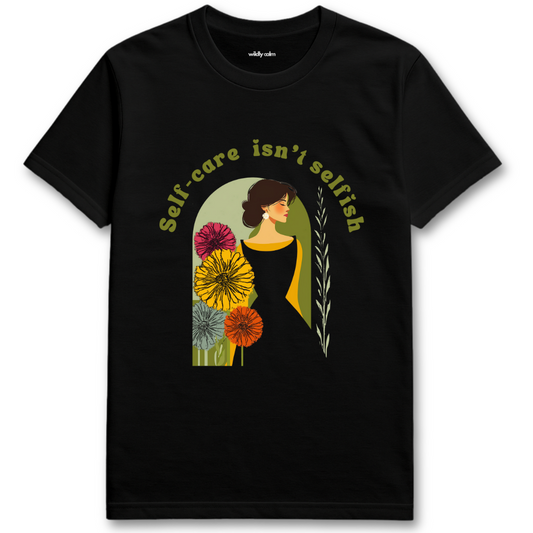 Self Care Isn't Selfish Black t-shirt with a graphic of a woman surrounded by flowers and the text 'Self-care isn't selfish'. - wildly calm