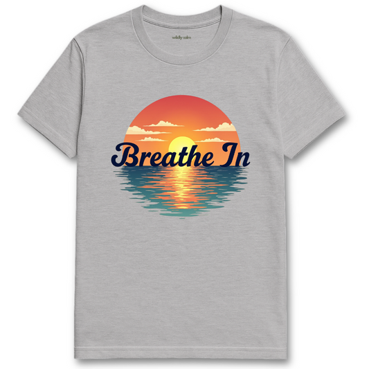 Sunrise-BreathIn_Sports Grey yoga t-shirt with a sunset graphic and 'Breathe In' text - wildly calm